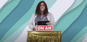 Jules presenting the award to Team of the Year at the Access Community Trust 2021 awards